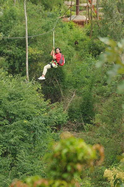 Adventure zipline activity at Wild Fog Resort in Sakleshpur.